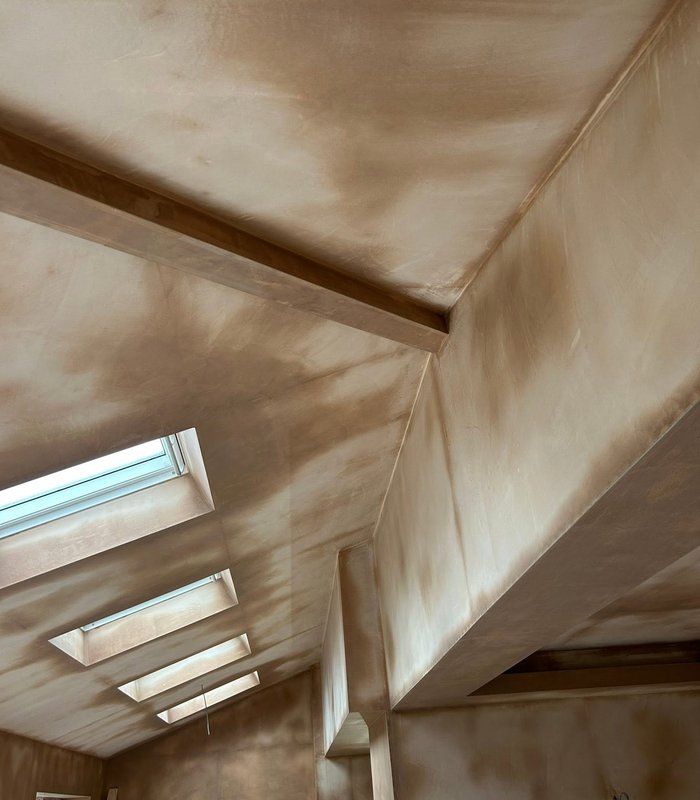 Fresh plaster around interior rooflights